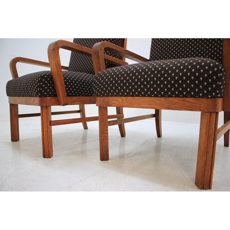 Paire de fauteuils marron en chêne