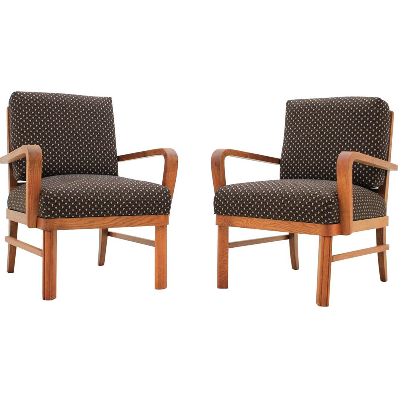 Pair of brown armchairs in oakwood