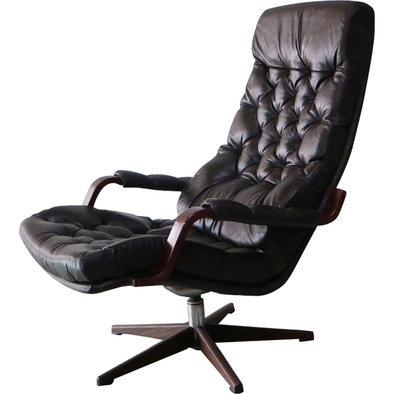 Danish swiveling armchair in black leather