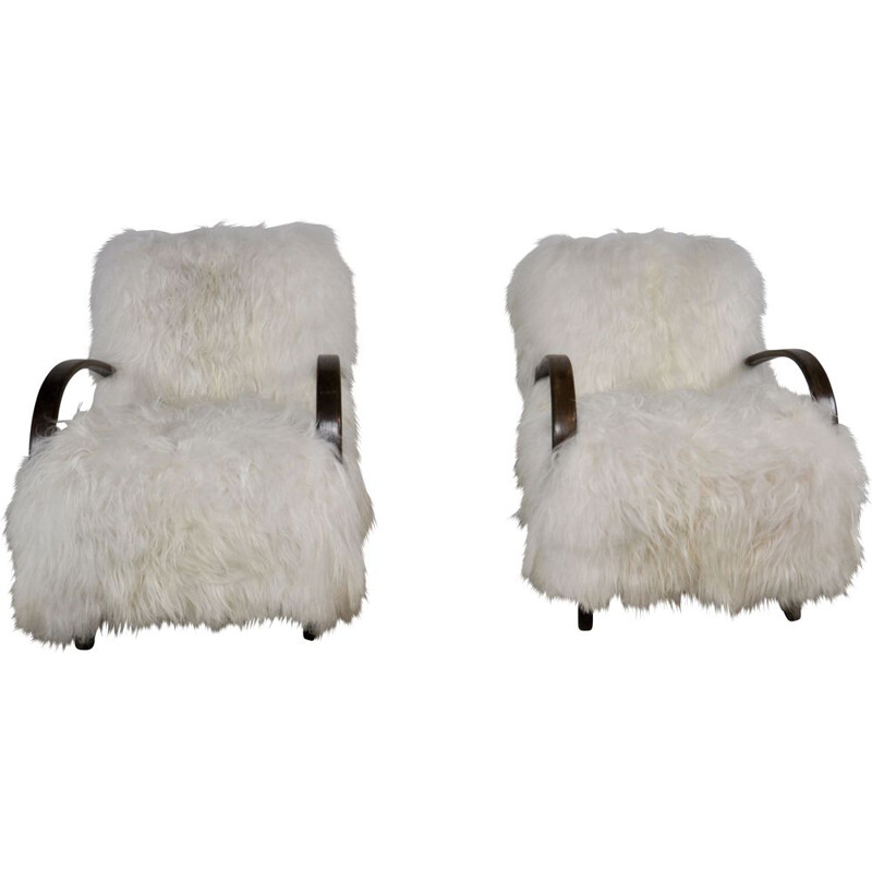 Pair of sheepskin armchairs by Jindrich Halabala