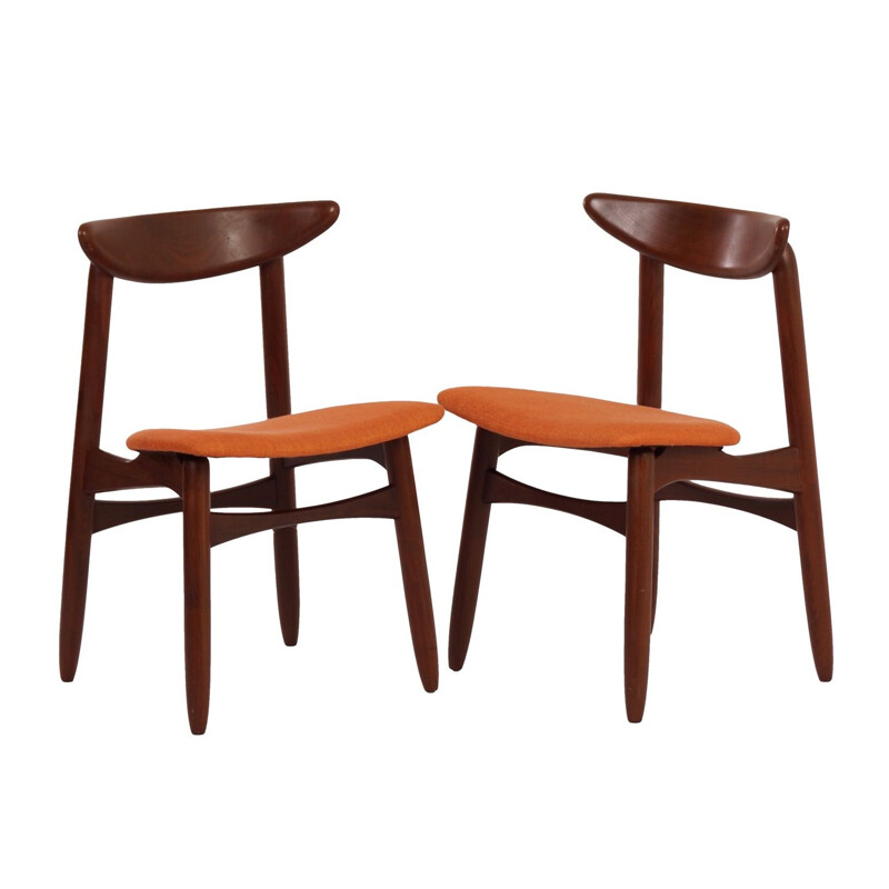 Pair of orange chairs in teak