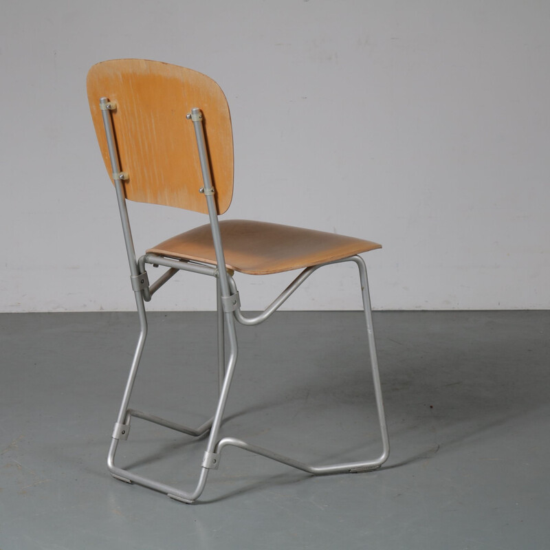 Vintage Aluflex chair by Hans Zollinger Sohre in wood and metal 1950
