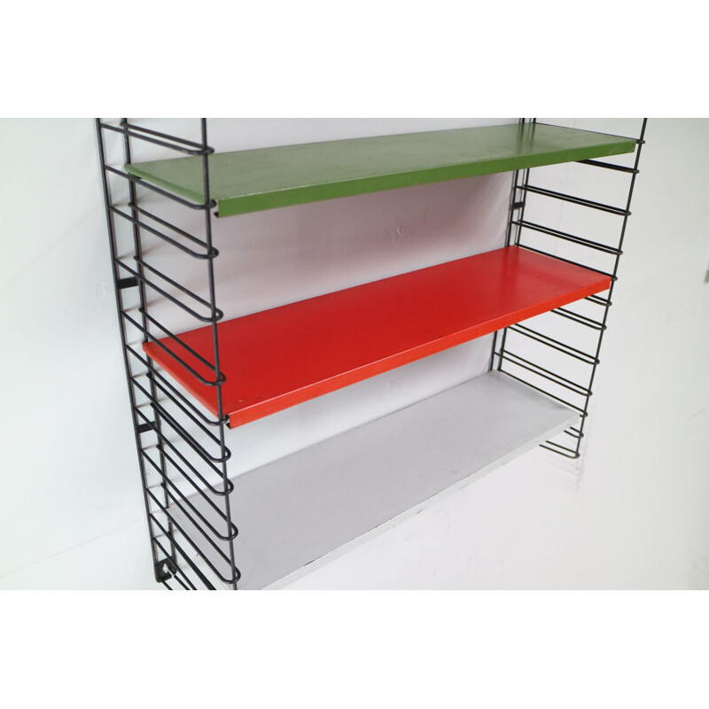 Hanging wall shelf in steel by Tomado