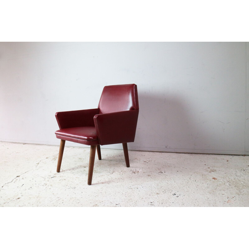 Vintage Danish armchair in red vinyl