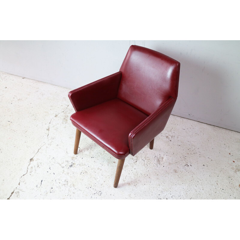 Vintage Danish armchair in red vinyl