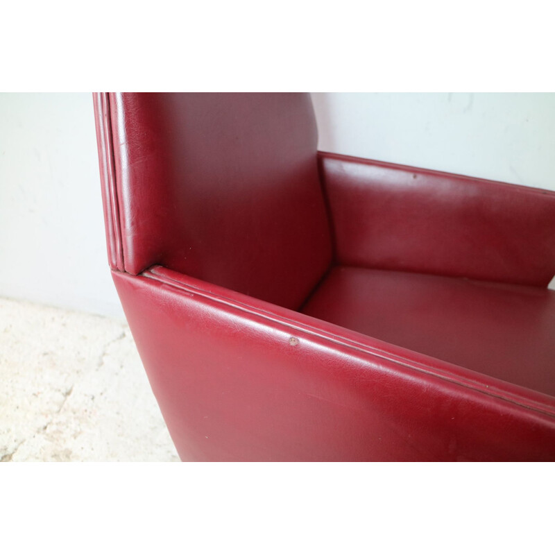 Vintage Danish armchair in red vinyl