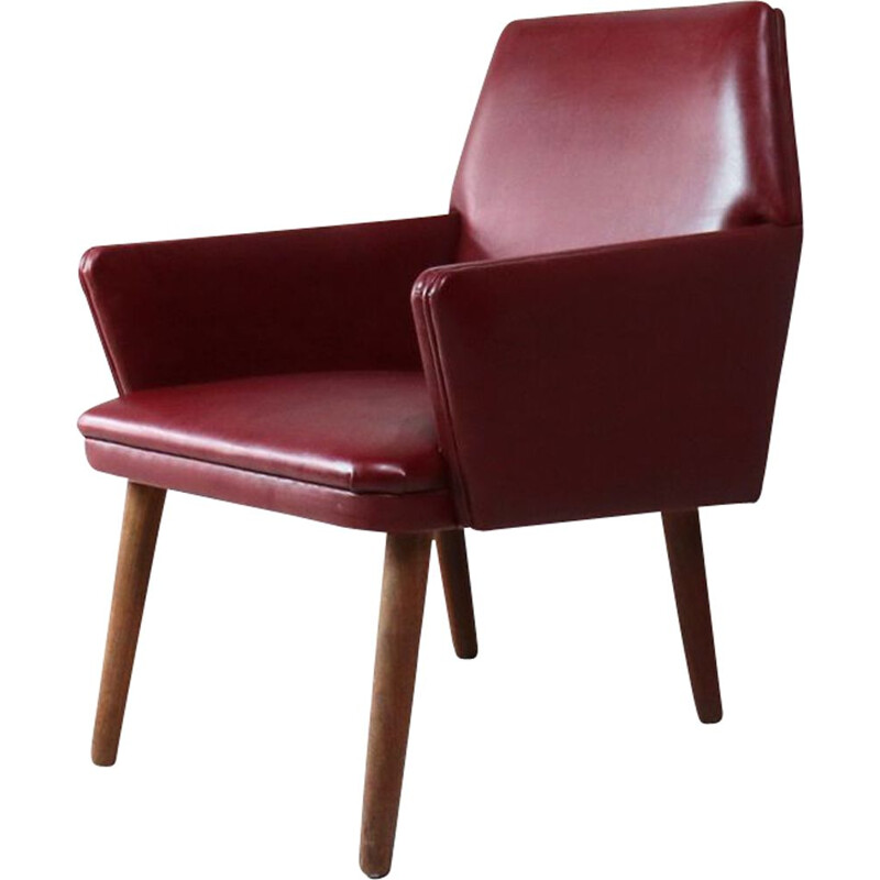 Vintage Danish armchair in red vinyl