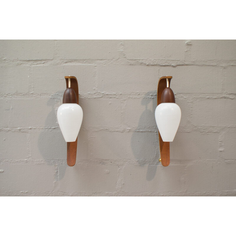 Set of 2 vintage wall lamps for Luxus in teakwood and glass 1960