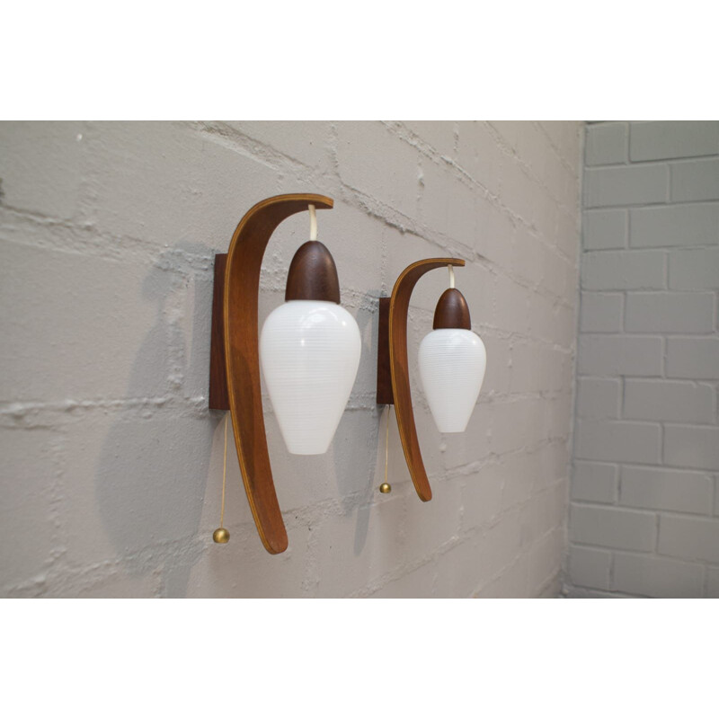 Set of 2 vintage wall lamps for Luxus in teakwood and glass 1960