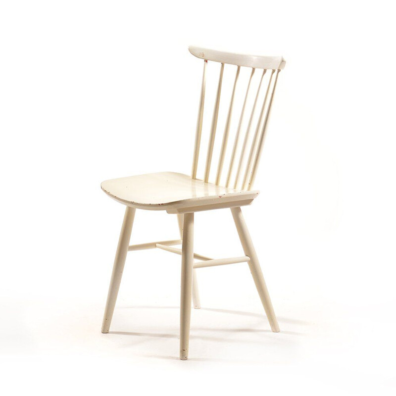 White vintage chair in solid wood and has been painted several times by TON, 1960