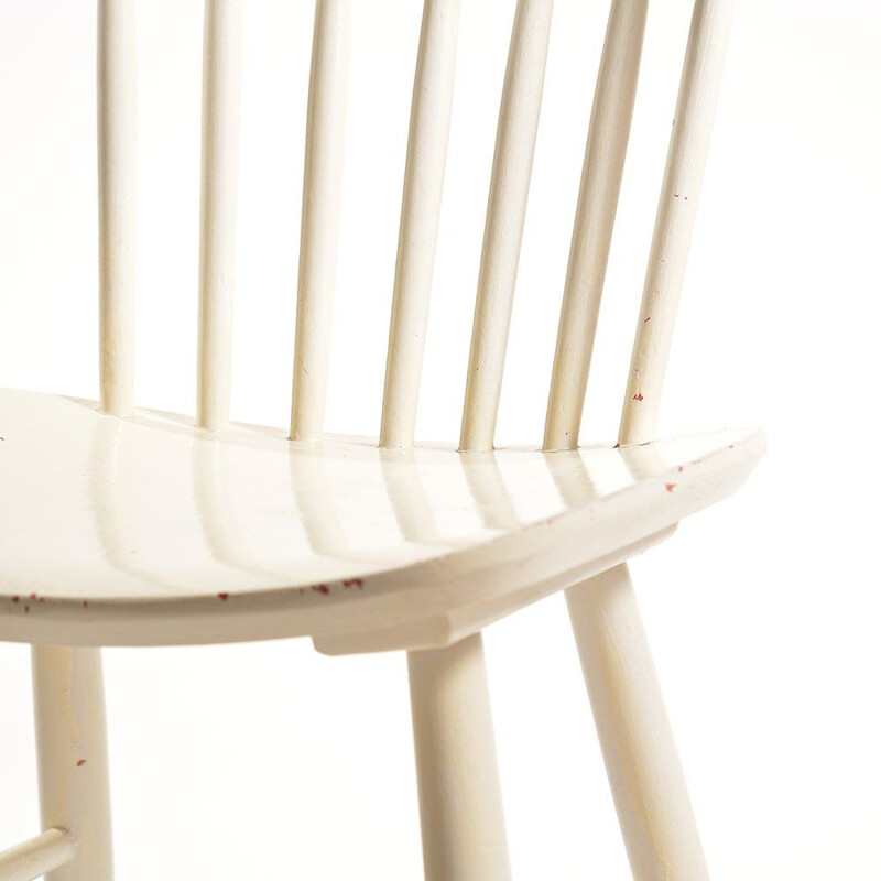 White vintage chair in solid wood and has been painted several times by TON, 1960