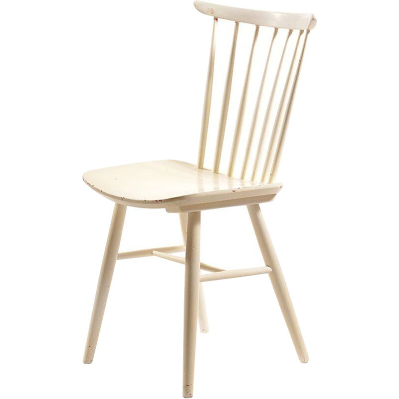 White vintage chair in solid wood and has been painted several times by TON, 1960