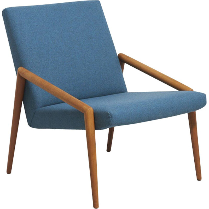 Vintage easy chair with rond teak armrest in blue wool fabric