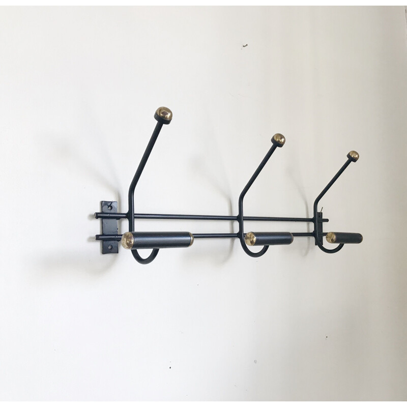 Vintage black and gold wall coat rack from the 60s