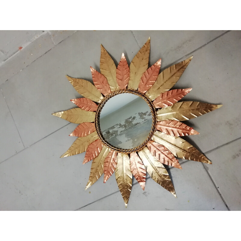 Vintage sun mirror in golden metal and copper 1970