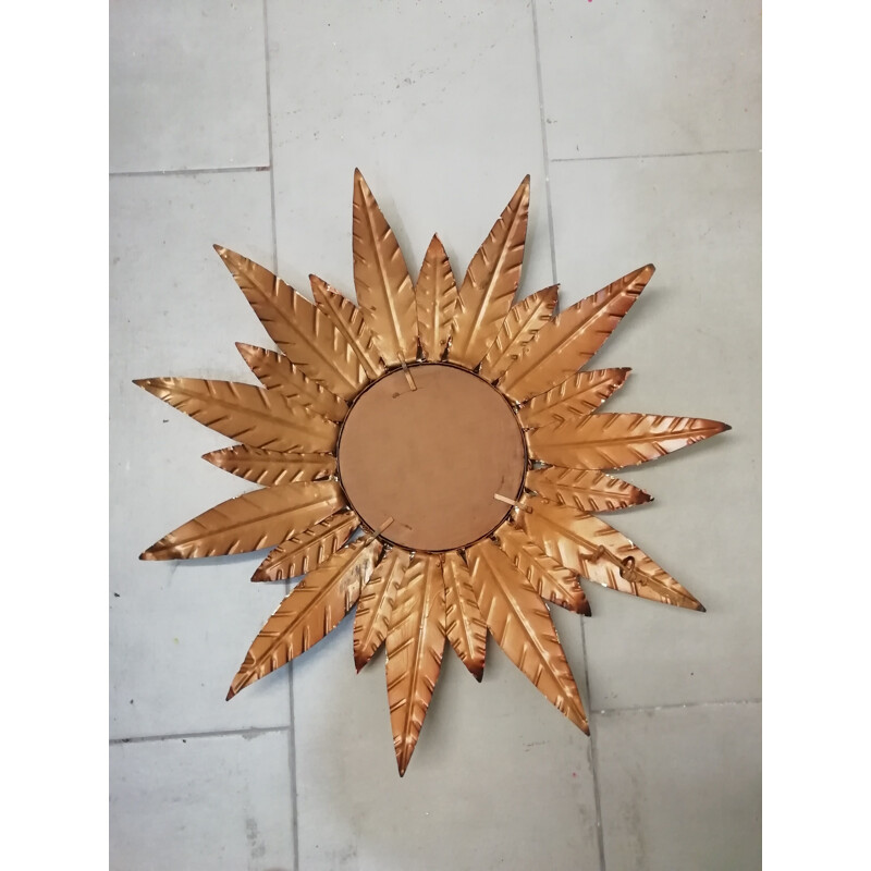 Vintage sun mirror in golden metal and copper 1970