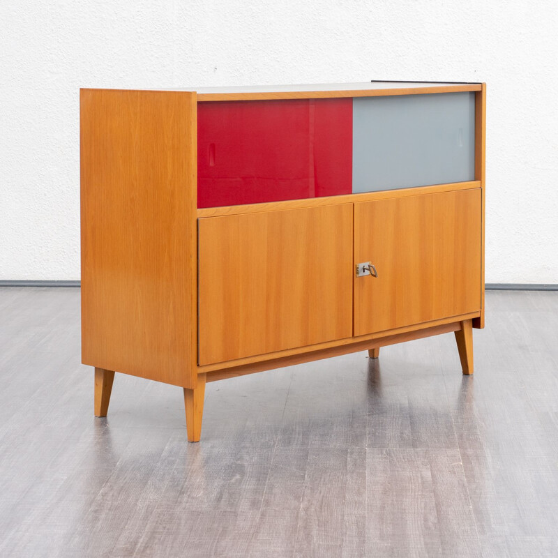 Vintage cabinet with coloured glass sliding doors from the 60s