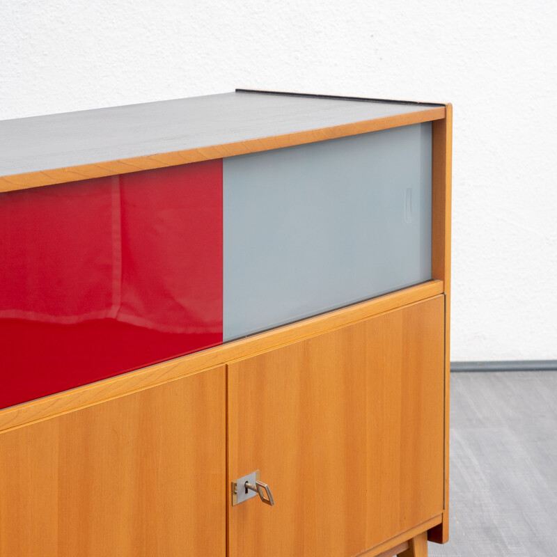Vintage cabinet with coloured glass sliding doors from the 60s