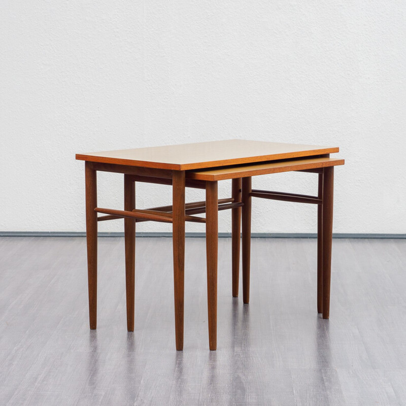 Pair of nesting tables in teak