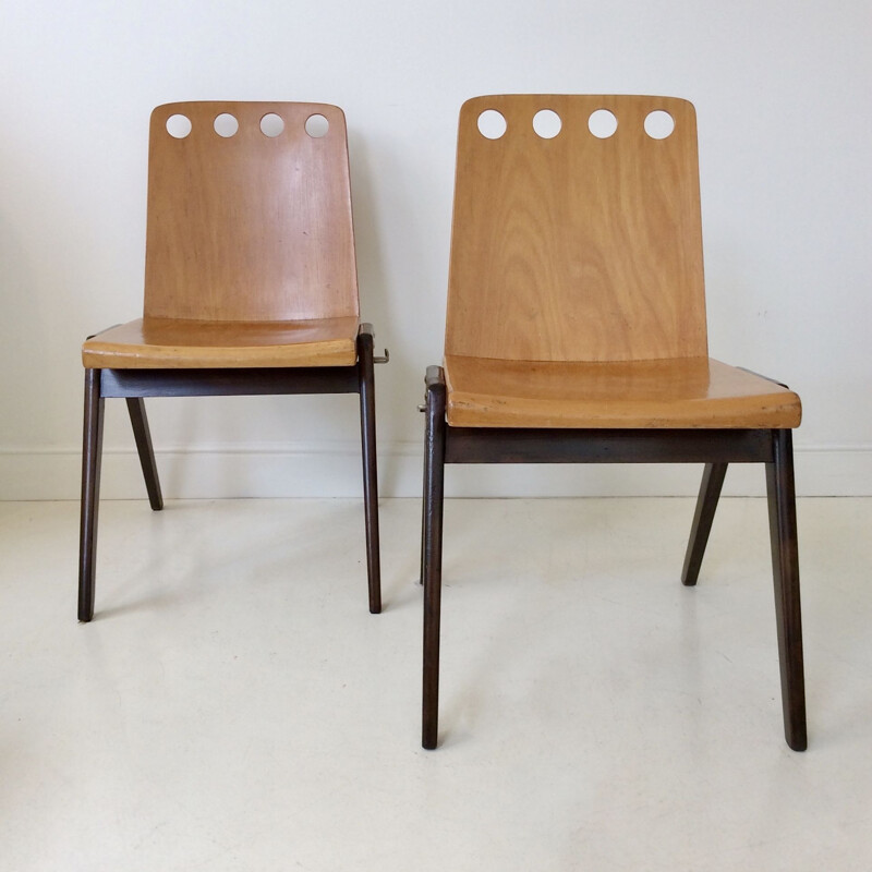 Set of 12 vintage stackable chairs in wood 1950