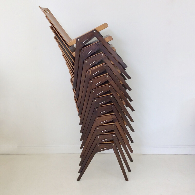Set of 12 vintage stackable chairs in wood 1950