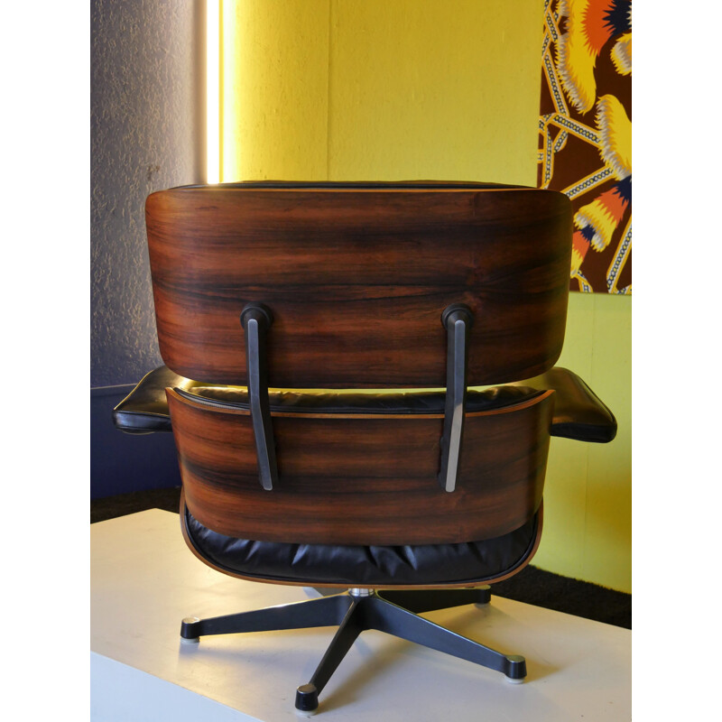 Vintage 670 armchair by Eames in rosewood and black leather 1970