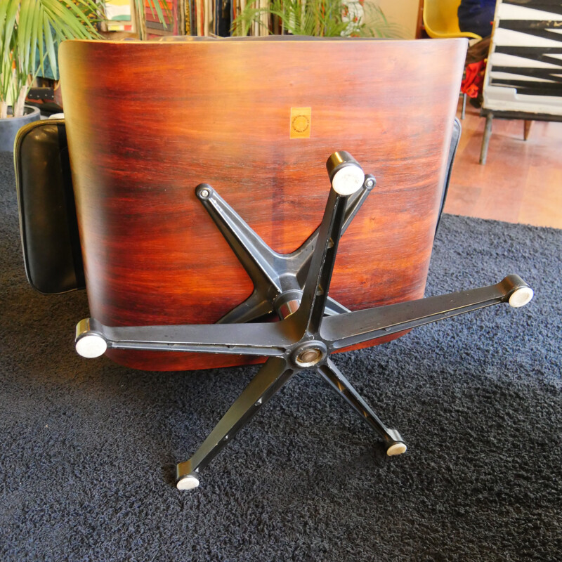 Vintage 670 armchair by Eames in rosewood and black leather 1970