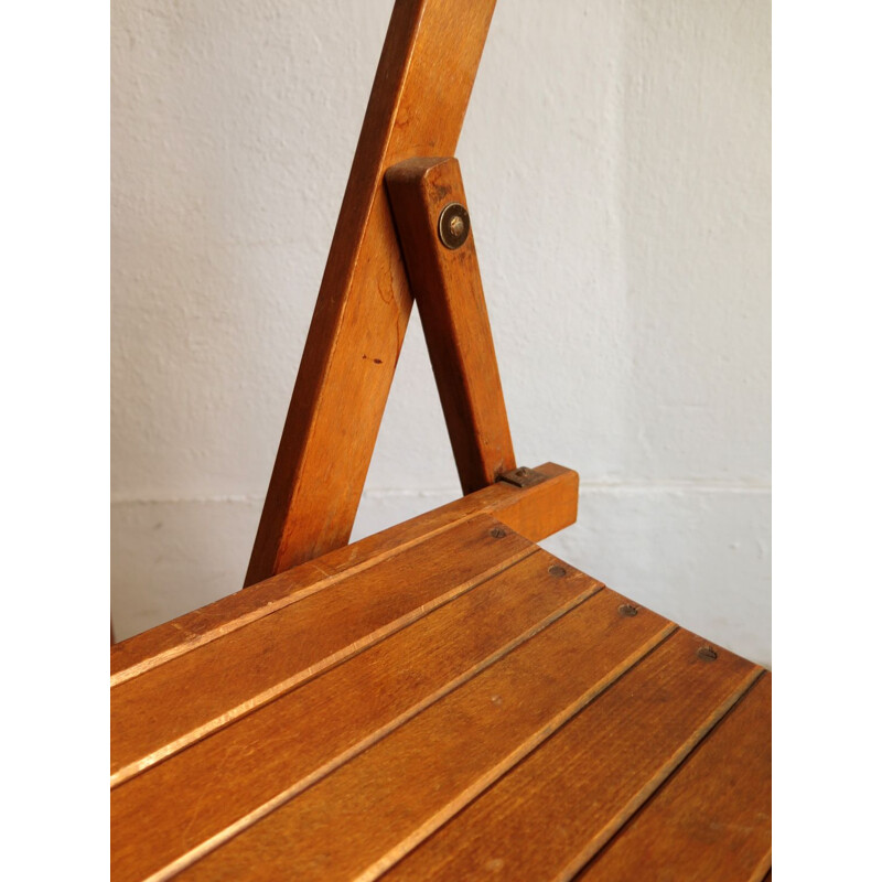 Vintage foldable chair in wood 1950