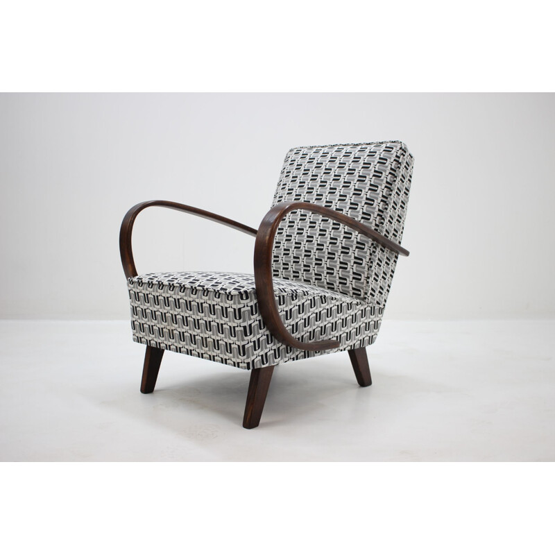 Vintage armchair in beech by Jindrich Halabala Czechoslovakia 1950s 