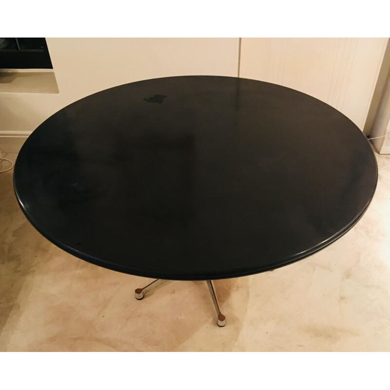 Circular table in birchwood by Eames for Vitra