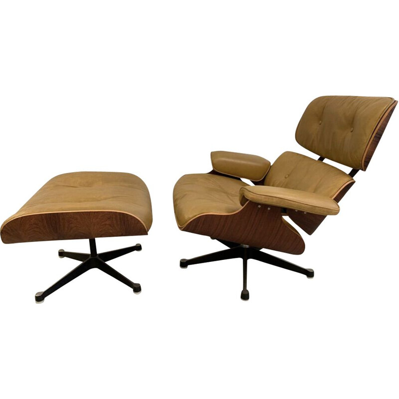 Vintage armchair and footrest 670 671 by Eames in leather and rosewood