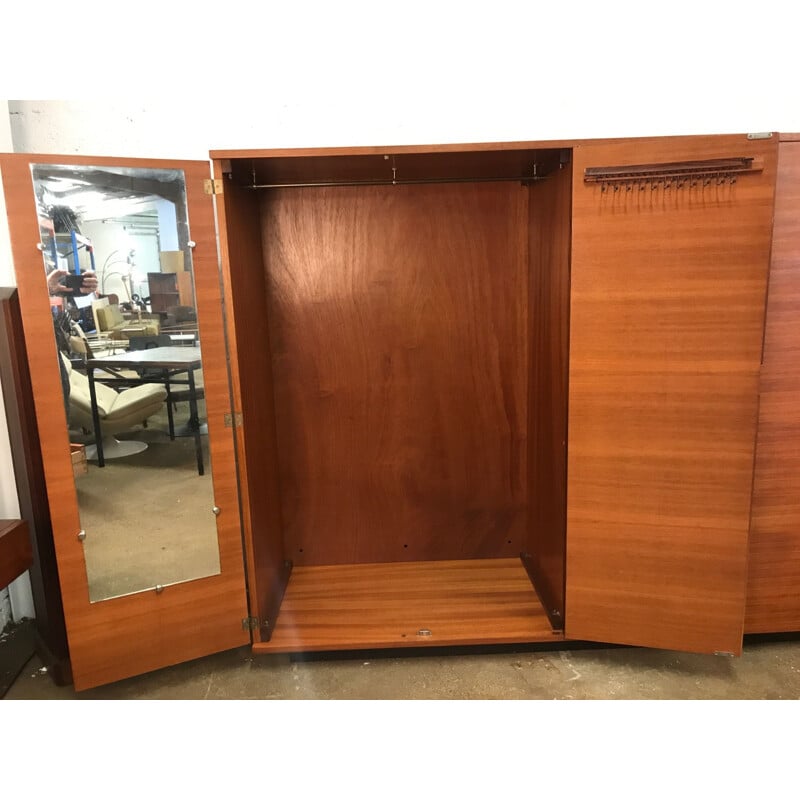 Vintage cabinet with drawers and tie rack with slight wear on a handle by Joseph-André Motte