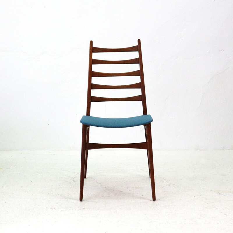 Blue dining chair in teak