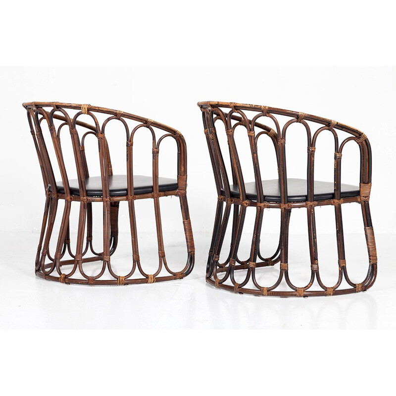 Set of 2 vintage rattan and skai armchairs from Rohé Noordwolde