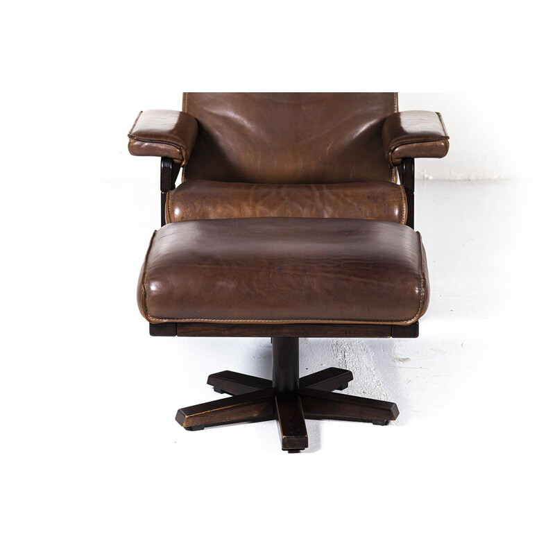 Vintage lounge swivel chair and ottoman by Harry de Groot for Leolux