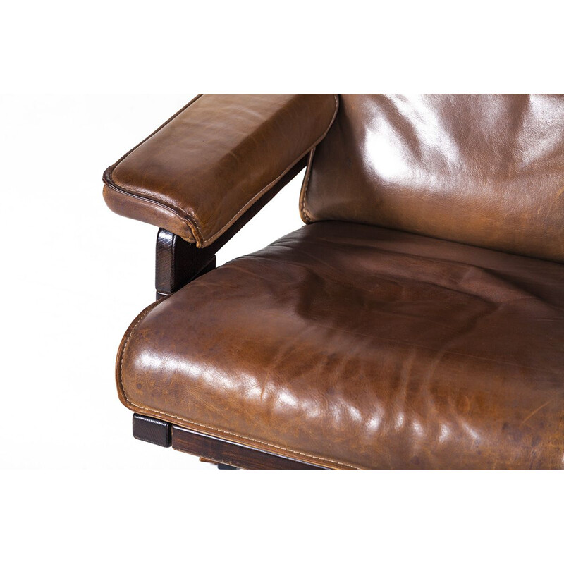 Vintage lounge swivel chair and ottoman by Harry de Groot for Leolux