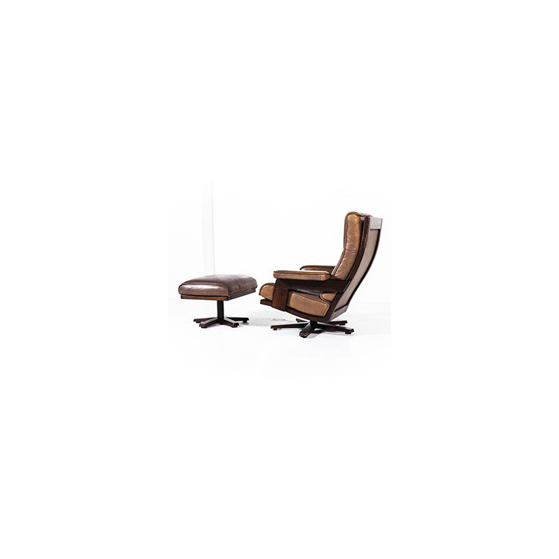 Vintage lounge swivel chair and ottoman by Harry de Groot for Leolux