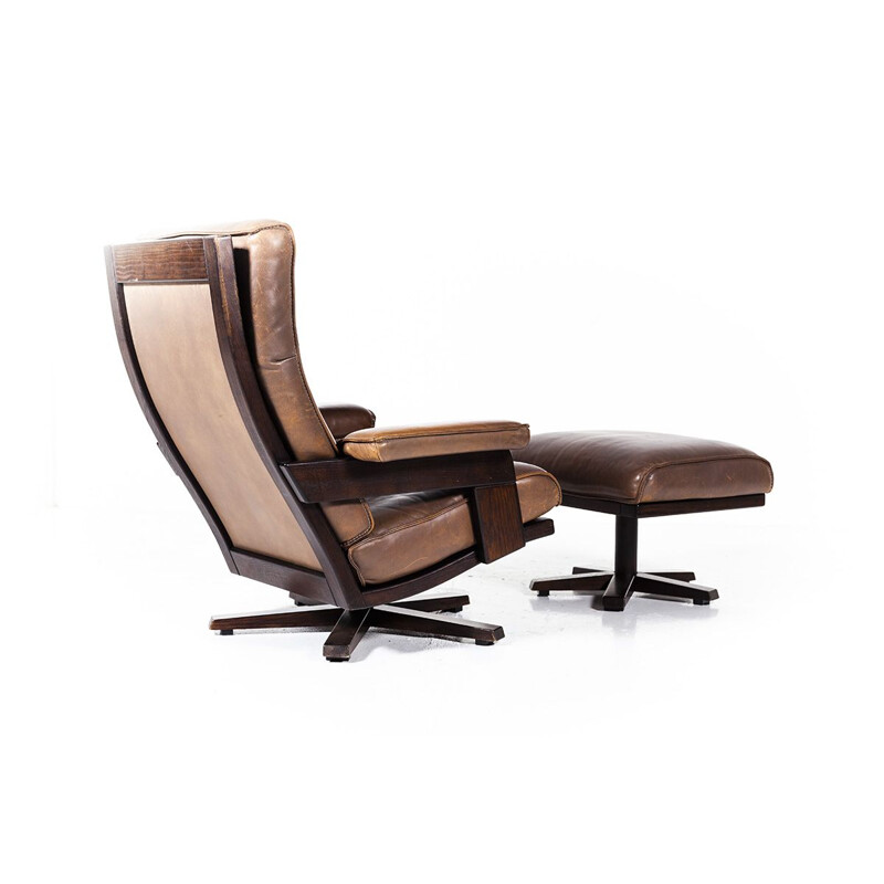 Vintage lounge swivel chair and ottoman by Harry de Groot for Leolux