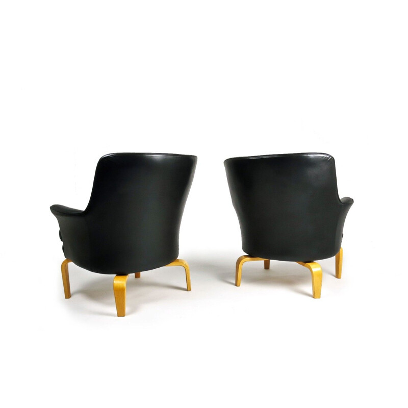 2 fauteuils vintage Suédois en cuir noir par Arne Norell, 1960