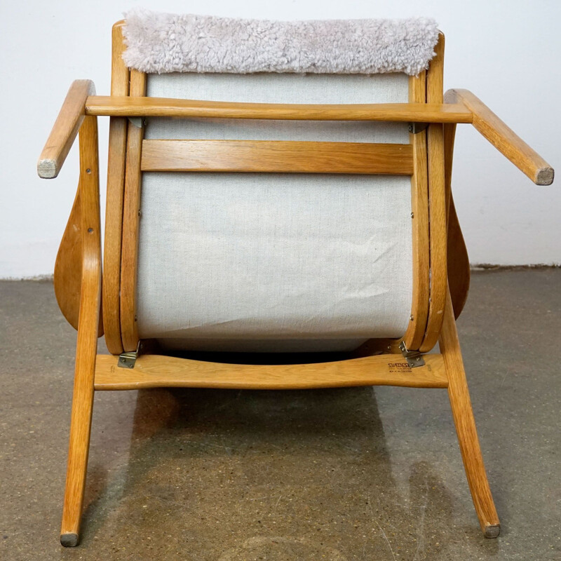 Vintage armchair oak and grey sheepskin Lamino by Yngve Ekström Sweden