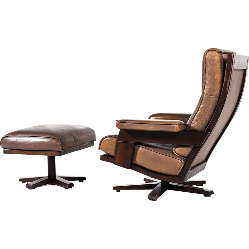 Vintage lounge swivel chair and ottoman by Harry de Groot for Leolux