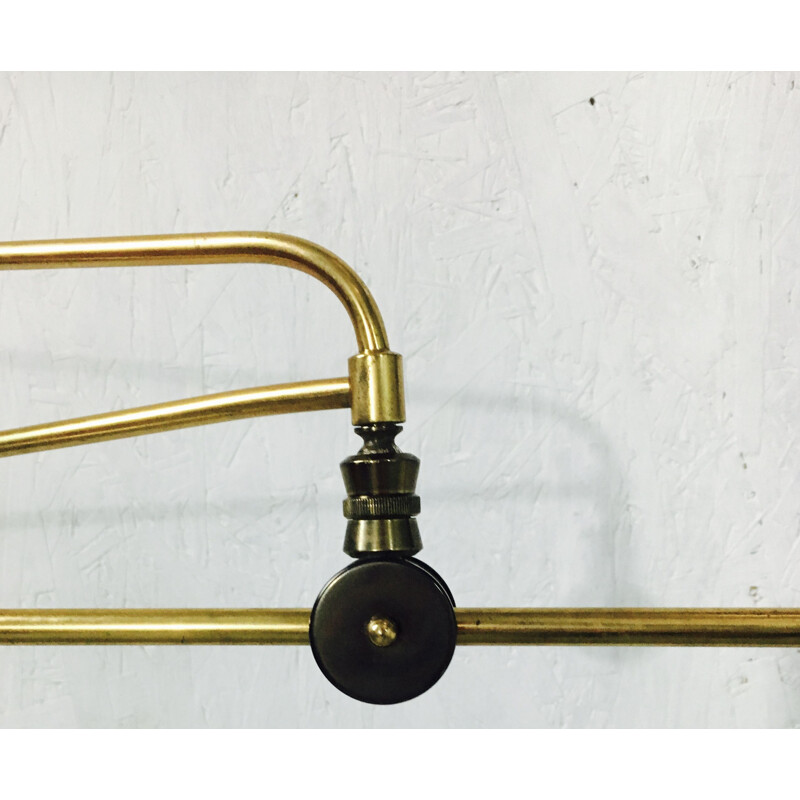 Vintage wall lamp in brass with pendulum 1950s