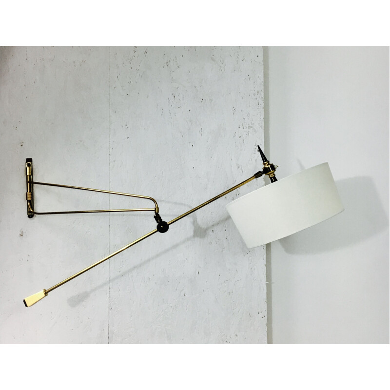 Vintage wall lamp in brass with pendulum 1950s