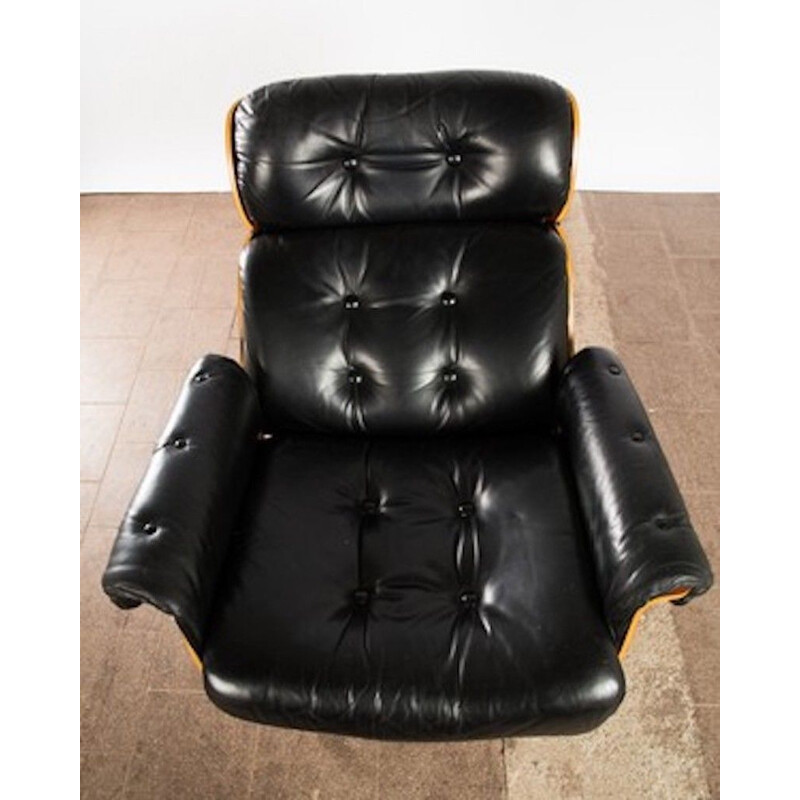 Vintage armchair and ottoman in leather and rosewood ,1960