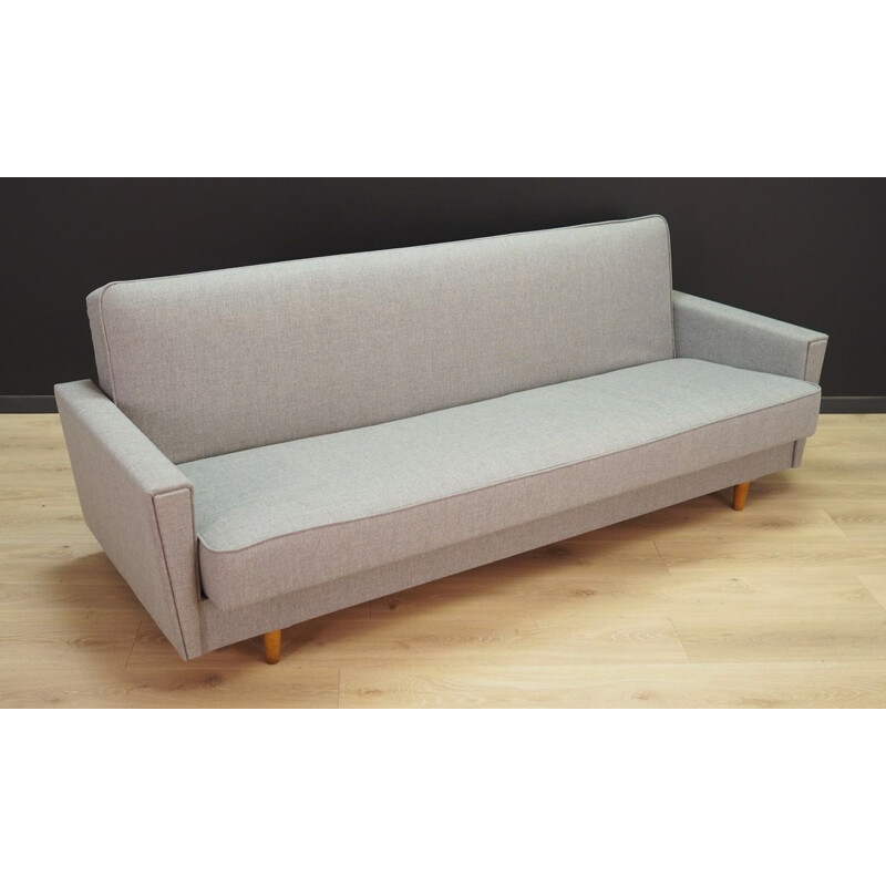 Canapé-lit gris scandinave en tissu
