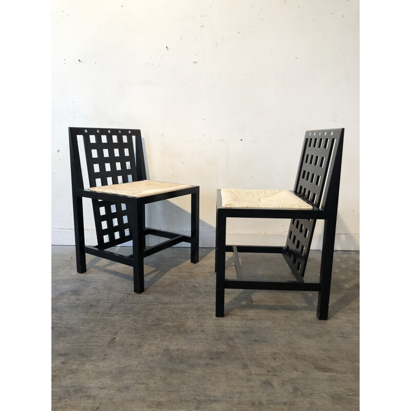 Pair of chairs in black ash by Charles Rennie