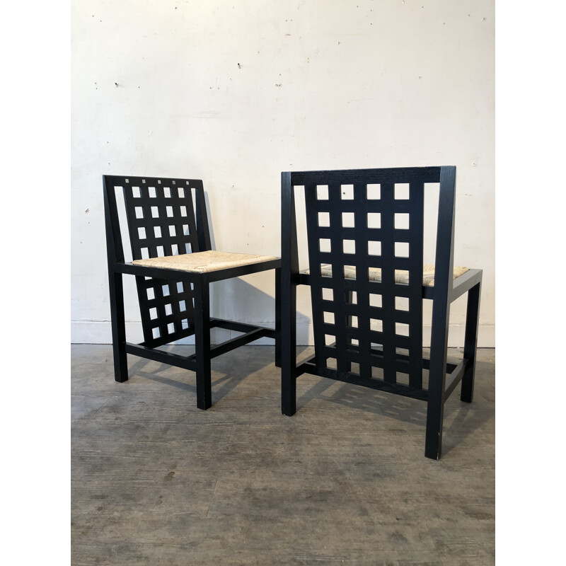 Pair of chairs in black ash by Charles Rennie
