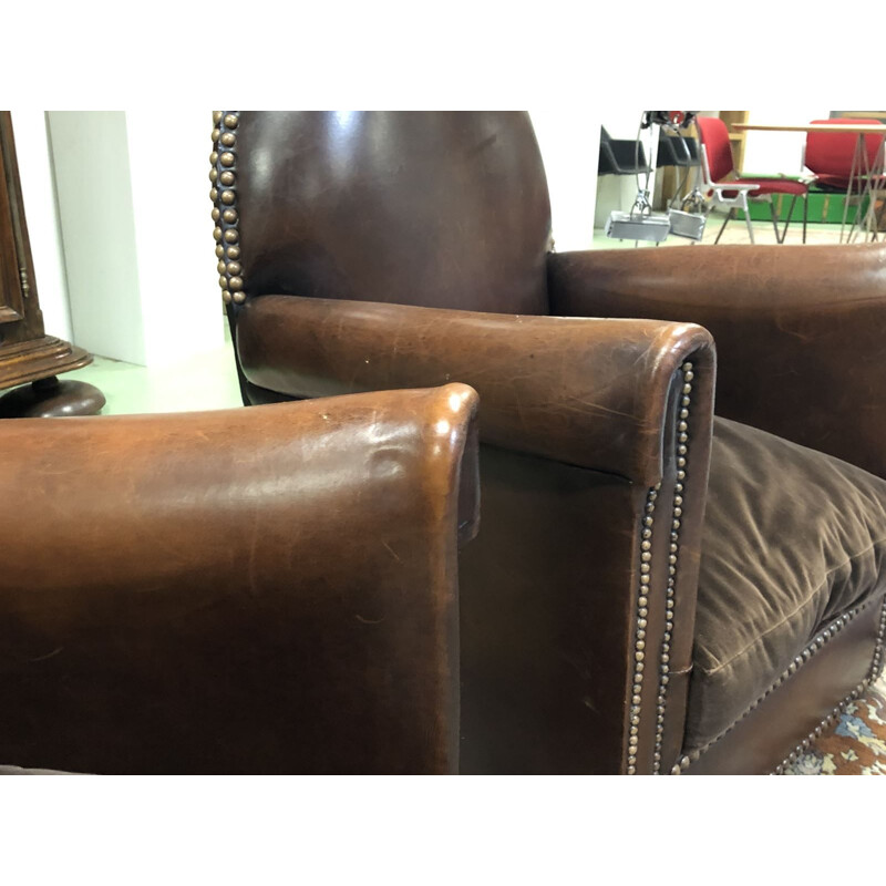 Pair of vintage french armchairs in brown leather 1950