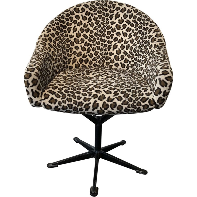 Swiveling leopard chair in metal