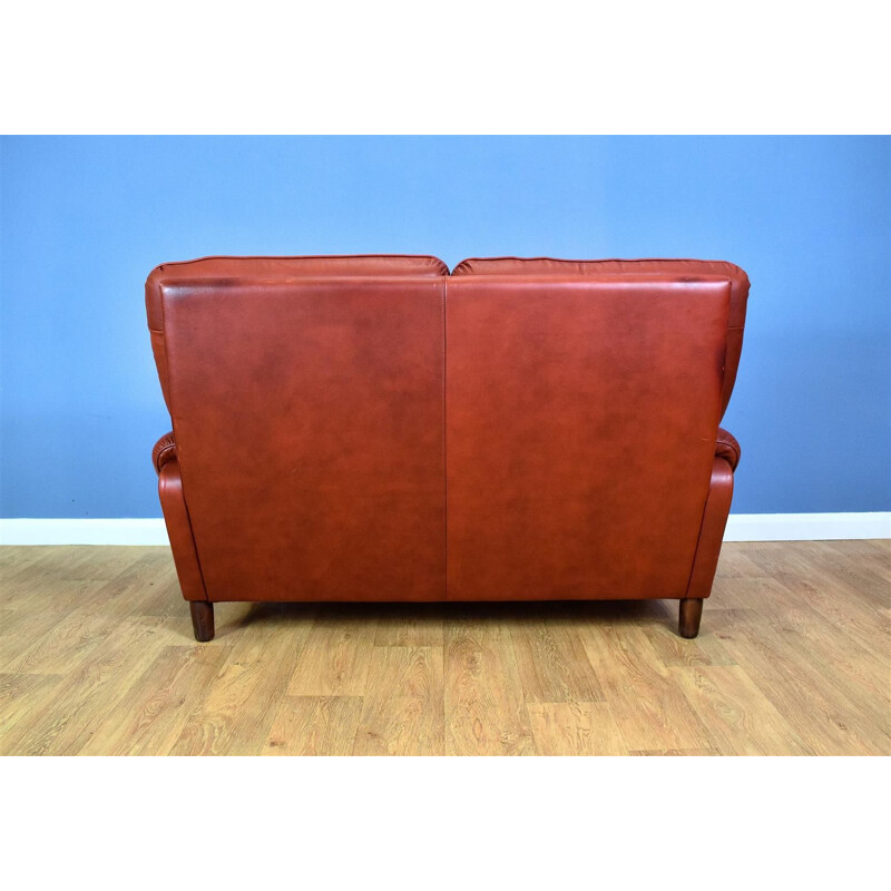 Vintage 2-seater sofa in red leather Danish 1970s